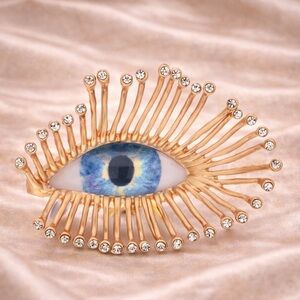 Mystic Gaze Gold Sunburst Crystal Blue Eye Motif Brooch